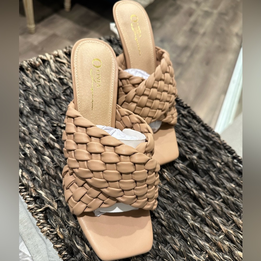 Nude braided-strap sandal; size 8.5 US. Brand new.